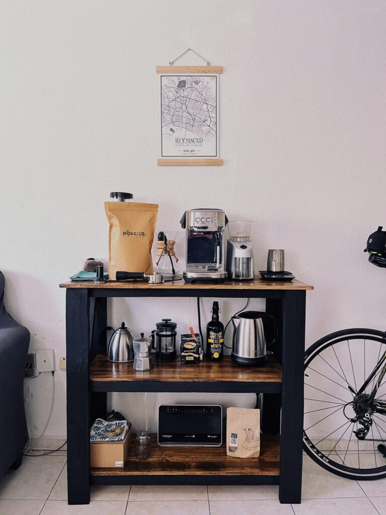Coffee station with a drip maker and mugs