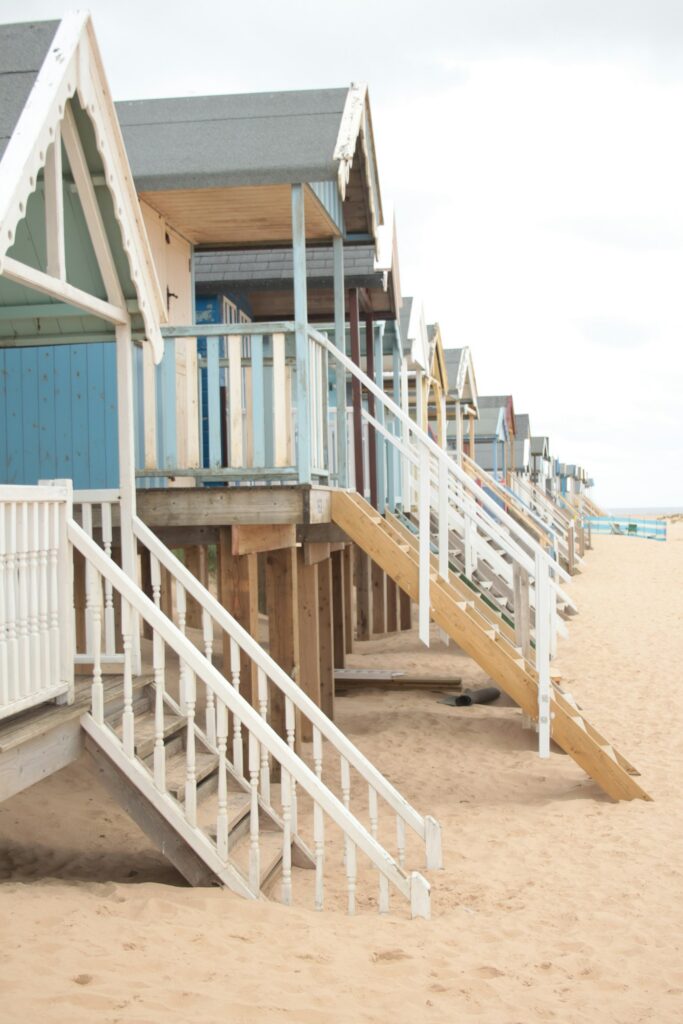 White exterior stairs up to the front porch