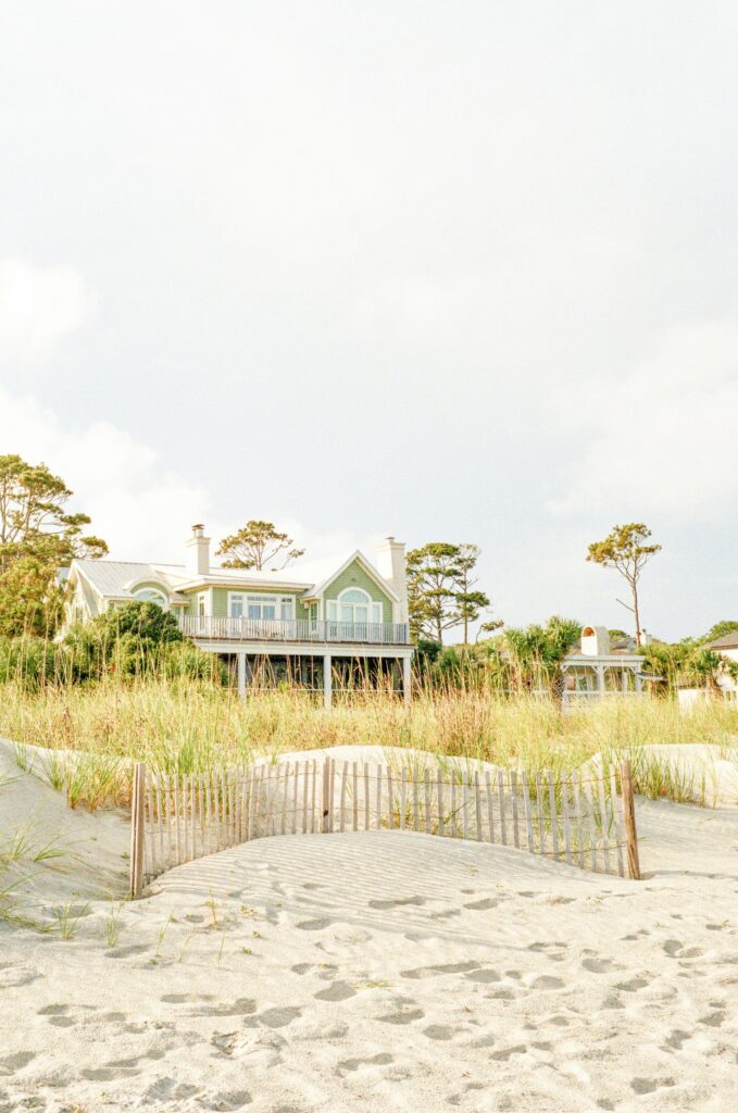 Beach houses beyond the dunes and sea oats